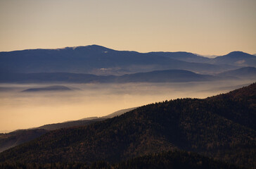 Scenic landscape with mountains covered in fog. Yedigoller National Park, Bolu, Turkey.