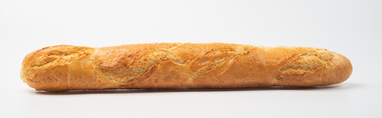 freshly baked baguette on white background, top view