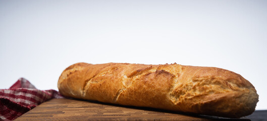 loaf of bread on wooden table