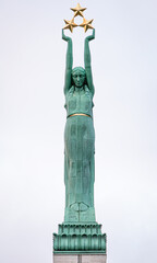 The Freedom Monument in Riga, Latvia. A woman named Milda holding three stars