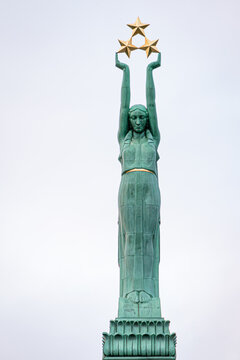 The Freedom Monument in Riga, Latvia. A woman named Milda holding three stars