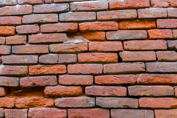 An old brick wall of solid brick