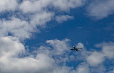 Fototapeta na wymiar Plane ready to taking to land. Blue sky on a background.