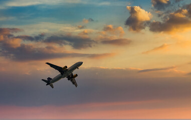 Passenger plane in the blue sky - Air travel