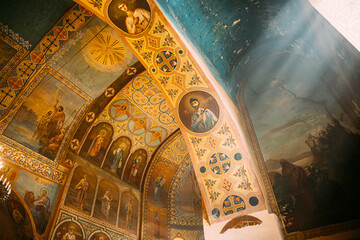 Mtskheta, Georgia. Sun ray shining in church. Fresco, Frescoes. Icons, of Shio-Mgvime Monastery....