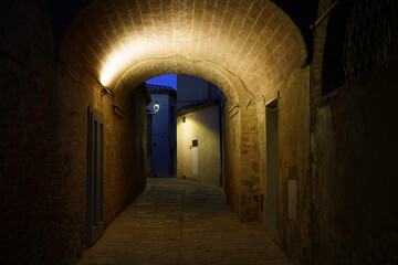 Fototapeta premium Buonconvento, medieval city in Siena province, by night