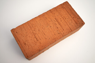 Rectangular orange brick on white isolate. Building bricks on a white background. Material for building a house.Sale of construction material.
