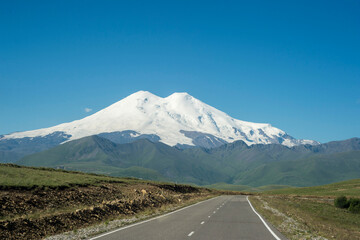 A road in the mountains. Elbrus - the highest mountain in Europe