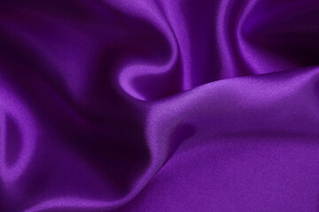 Purple fabric cloth texture for background and design art work, beautiful crumpled pattern of silk or linen.