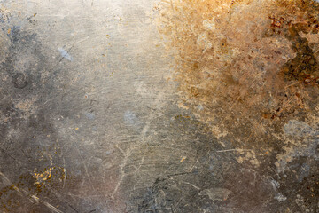 Metalic surface stained with brown burned oil and grease