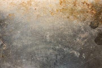 Metalic surface stained with brown burned oil and grease