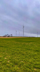 Electric wind turbine generating with blue sky and turbo generator