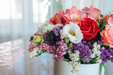 Bouquet of flowers ustoma, roses and alstroemeria.