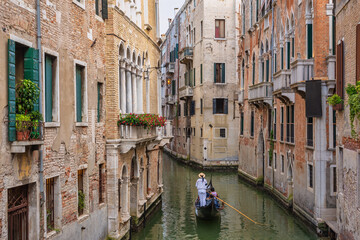 Venice Italy, city skyline at canal in Venice with Gondola boat