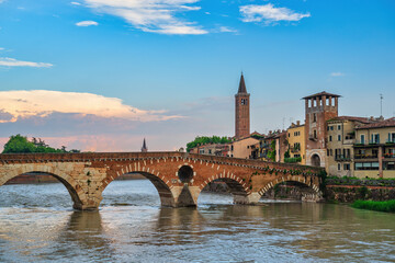 Fototapeta premium Verona Italy, city skyline at Adige river and Basilica di Santa Anastasia with Ponte Pietra bridge