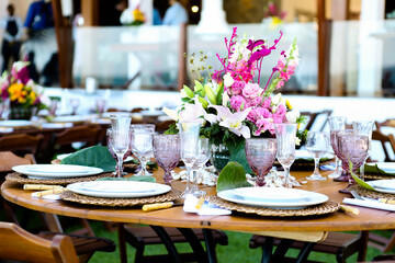 table setting in a party, ornamental flowers