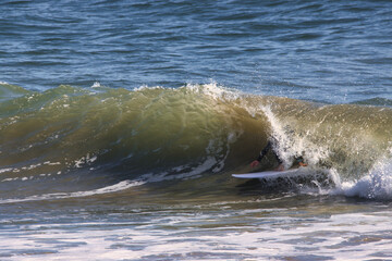 Surfing Rincon cove in California