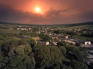 Picturesque landscape of the middle of Poland illuminated by the falling slogan.