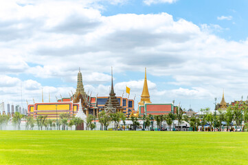 Naklejka premium Grand palace or well known among tourist as Temple of the Emerald Buddha or local known Wat phra keaw at on a cloudy blue sky day at Bangkok, Thailand.