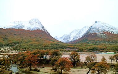 Fototapeta premium Amazing Autumn Landscape with Snow-capped Mountainrages in Tierra del Fuego, Patagonia, Argentina, South America