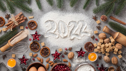 Ingredients for Christmas and New Year 2022 baking with copy space.