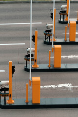 Automatic barriers with video cameras at the entrance to the paid parking