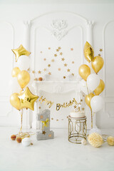 First year party decoration in gold