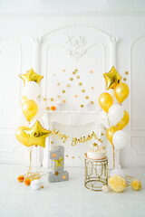 First year party decoration in gold