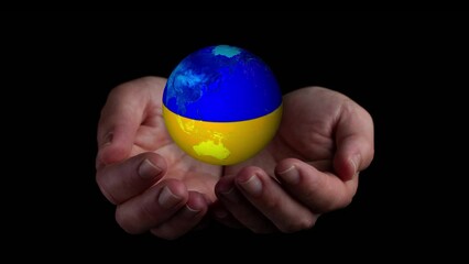 video hands holding world globe painted with ukraine flag on black background - Powered by Adobe