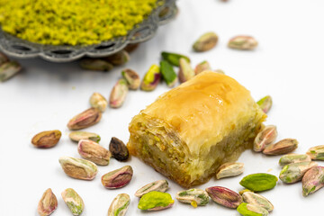 Baklava with pistachio on a white background. Traditional Mediterranean cuisine delicacies. close-up baklava