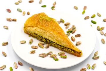 Carrot slice baklava on a white background. Traditional Mediterranean cuisine delicacies. close-up pistachio baklava. Local name havuc dilim baklava