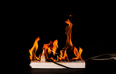 A short circuit at night causes fire and flames. Using non-standard equipment can be dangerous....