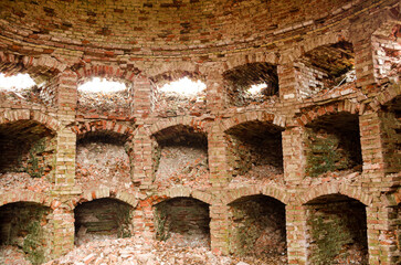 Abandoned red brick chapel in Dunalka Manor, Latvia.
