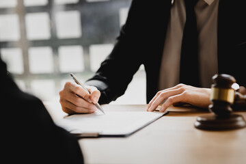 Client was listening to a lawyer advising on an embezzlement case, explaining the details of the...