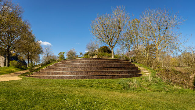Plant tiers in a park with a green background and blue sky
