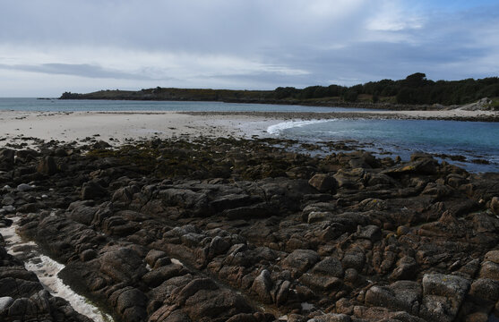 The sand bar that joins The Isle of Gugh to the Island of St Agnes in the Scilly Islands Cornwall