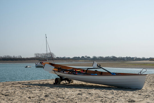 rowing boat abandoned on a beach