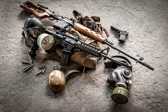 automatic carabine, sniper rifle, backpack and gas mask