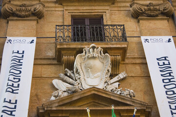 Coat of arms on Museum Palazzo Belmonte Riso (or RISO, Contemporary Art Museum of Sicily) in...