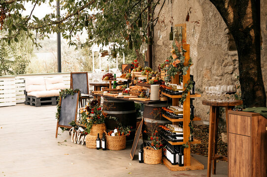 Fototapeta a fair of food and wine. table with food outside in the yard. Provence style