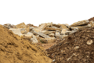 Fototapeta na wymiar A pile of rubble isolates of concrete blocks obtained from the demolition of an old road.