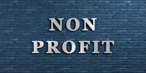 Obraz premium Non Profit. Blue brick wall with silver glossy capital letters. Charity, helping and voluntary concept. 3D illustration