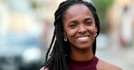 African woman smiling. Portrait black lady smile at camera