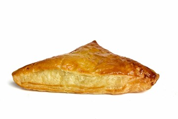 Triangular shaped butter bread pie on white background.