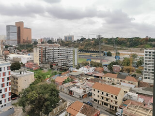 Fototapeta na wymiar Aerial view of downtown Luanda, Coqueiros district, Coqueiros Stadium, marginal and central buildings, Ingombota, Luanda Angola