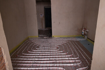 Installation of underfloor heating in the kitchen