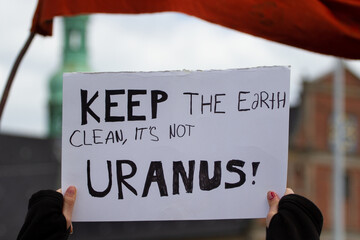 A funny sign during a protest for climate change, global warming and environment in Copenhagen,...