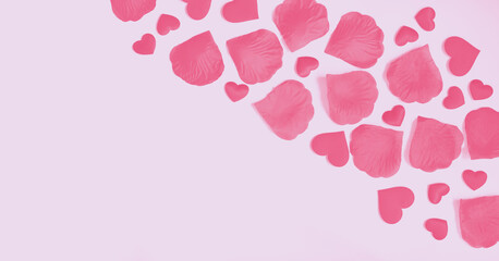 Satin pink hearts and rose petals on white background. Greeting card template. Flat lay. Copy space