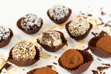 Chocolate candies collection. Beautiful Belgian truffles isolated on white background