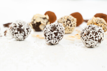 Fototapeta na wymiar Chocolate candies collection. Beautiful Belgian truffles isolated on white background